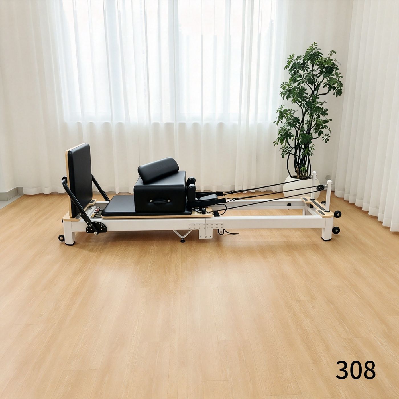 The reformer in black upholstery, colour 308.